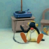 Penguin listening to records