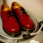 Shoes spinning on a Technics SL-1200