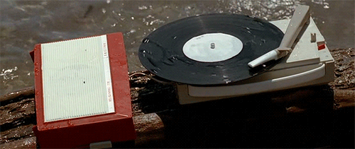 Old school record player by the water